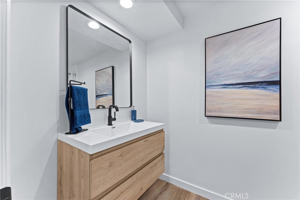 29 Bethany Drive Irvine, CA 92603 - Photo 33 of 44 a bathroom with a sink mirror and vanity