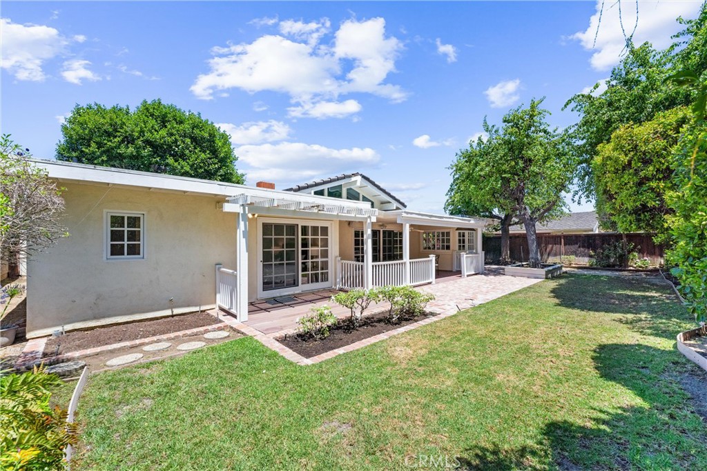 29 Bethany Drive Irvine, CA 92603 - Photo 35 of 44 a view of a house with backyard and sitting area
