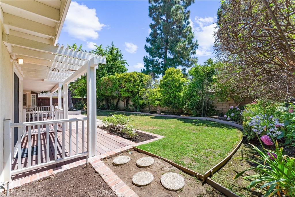 29 Bethany Drive Irvine, CA 92603 - Photo 38 of 44 a view of a wooden terrace with a swimming pool