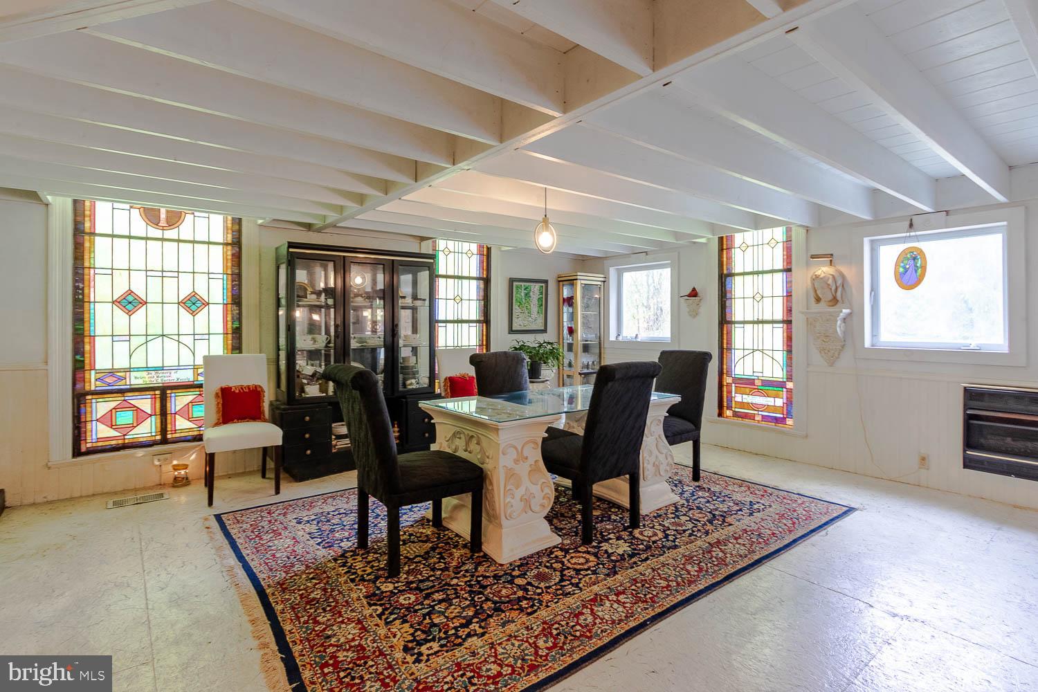 125 Colorado Road Munson, PA 16860 - Photo 18 of 43 a living room with furniture a rug and a table