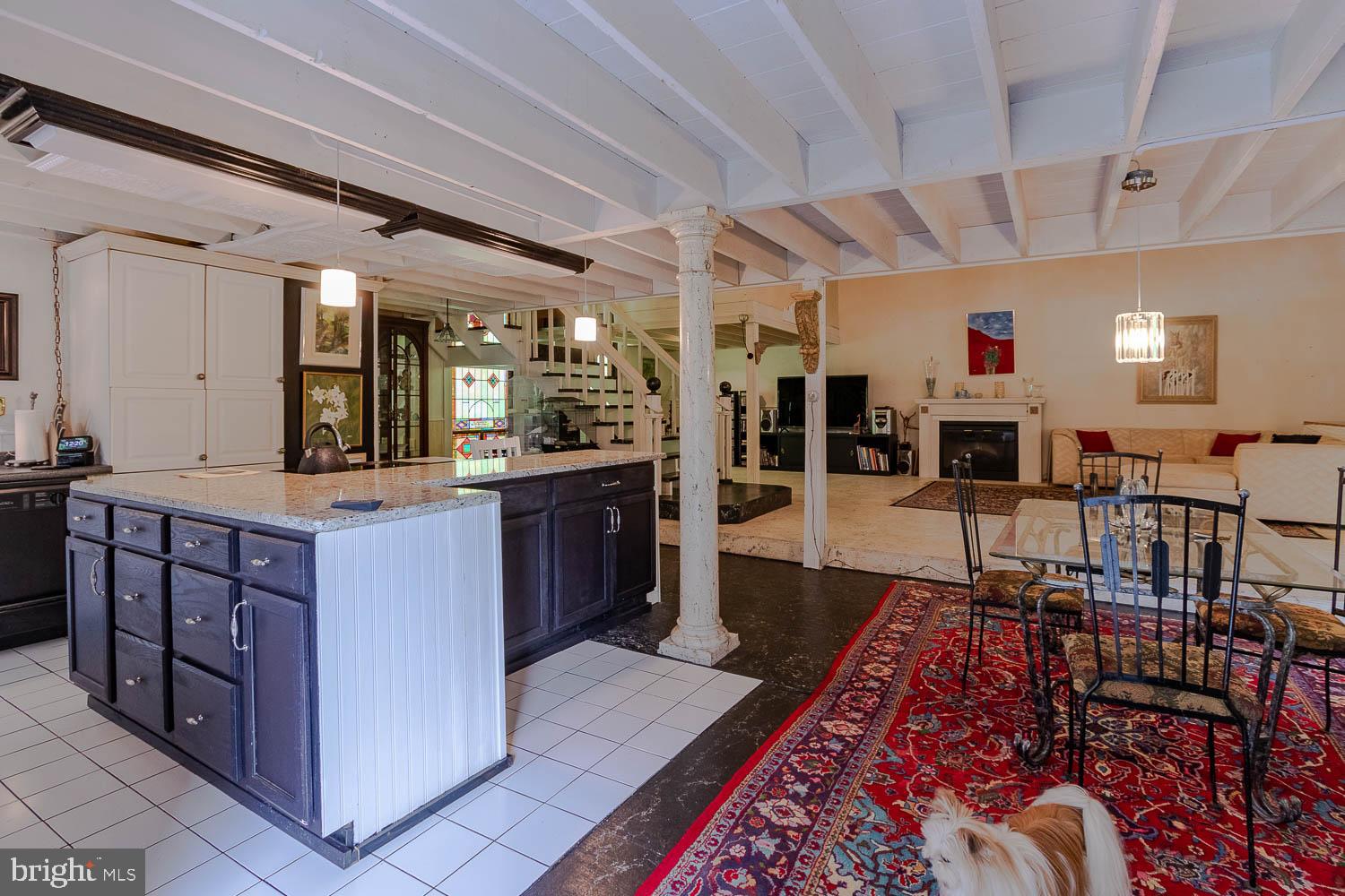 125 Colorado Road Munson, PA 16860 - Photo 20 of 43 a large living room with stainless steel appliances granite countertop furniture