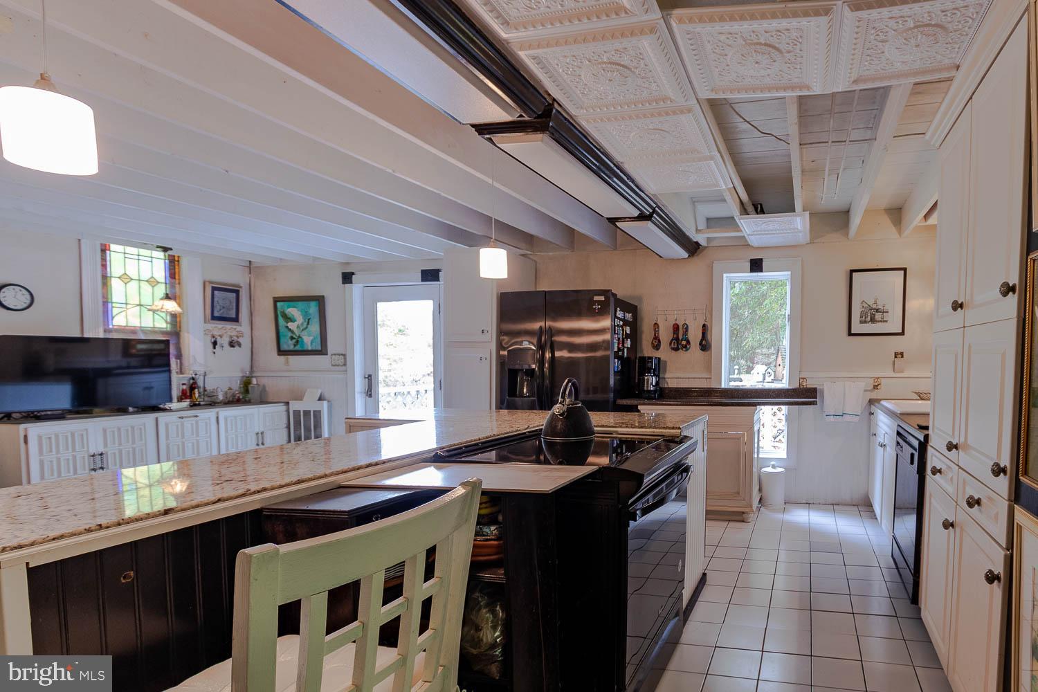 125 Colorado Road Munson, PA 16860 - Photo 23 of 43 a kitchen with a sink appliances and cabinets