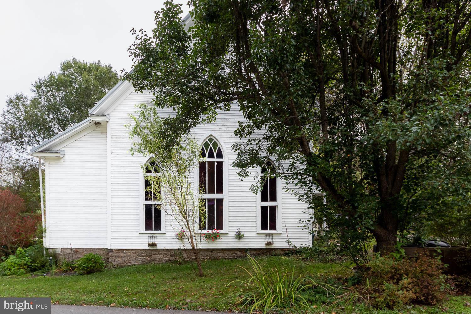 125 Colorado Road Munson, PA 16860 - Photo 3 of 43 a front view of house with yard