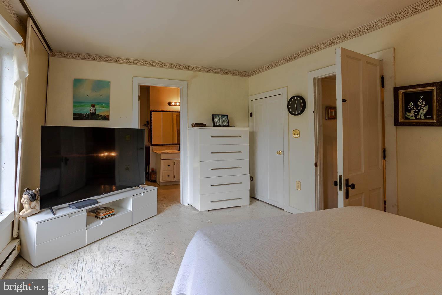 125 Colorado Road Munson, PA 16860 - Photo 32 of 43 a living room with window and a flat screen tv