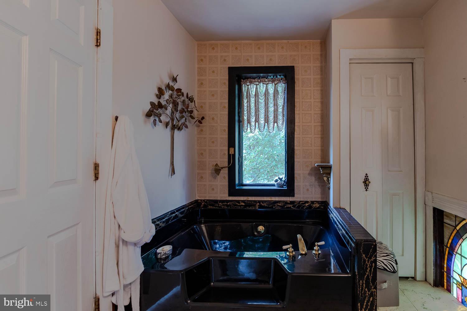 125 Colorado Road Munson, PA 16860 - Photo 34 of 43 a room with furniture and a window