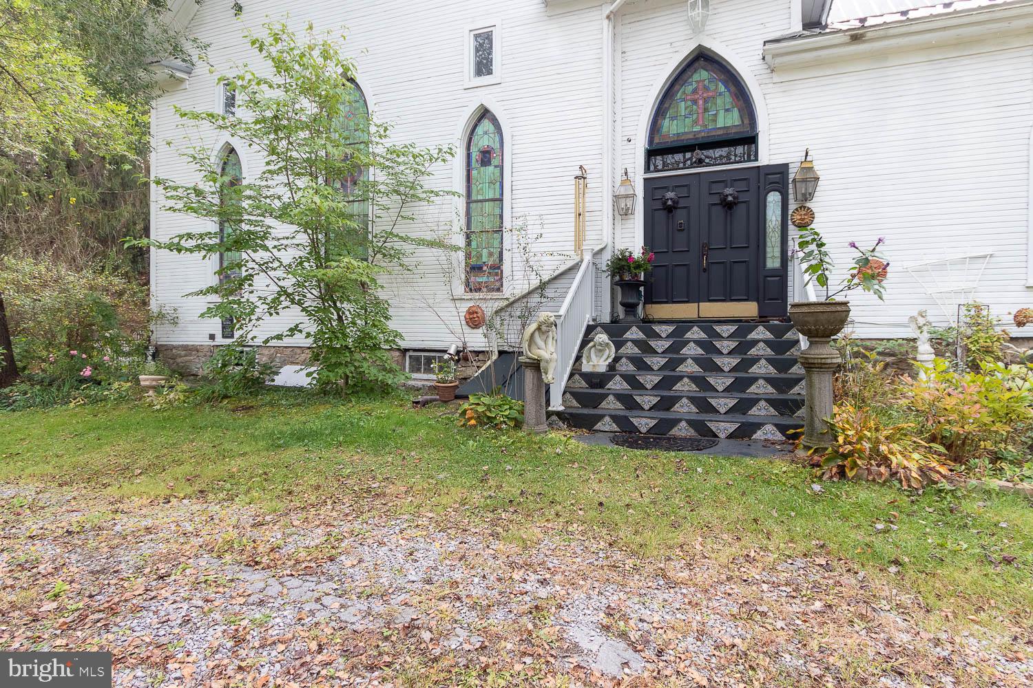 125 Colorado Road Munson, PA 16860 - Photo 6 of 43 a view of front door and yard
