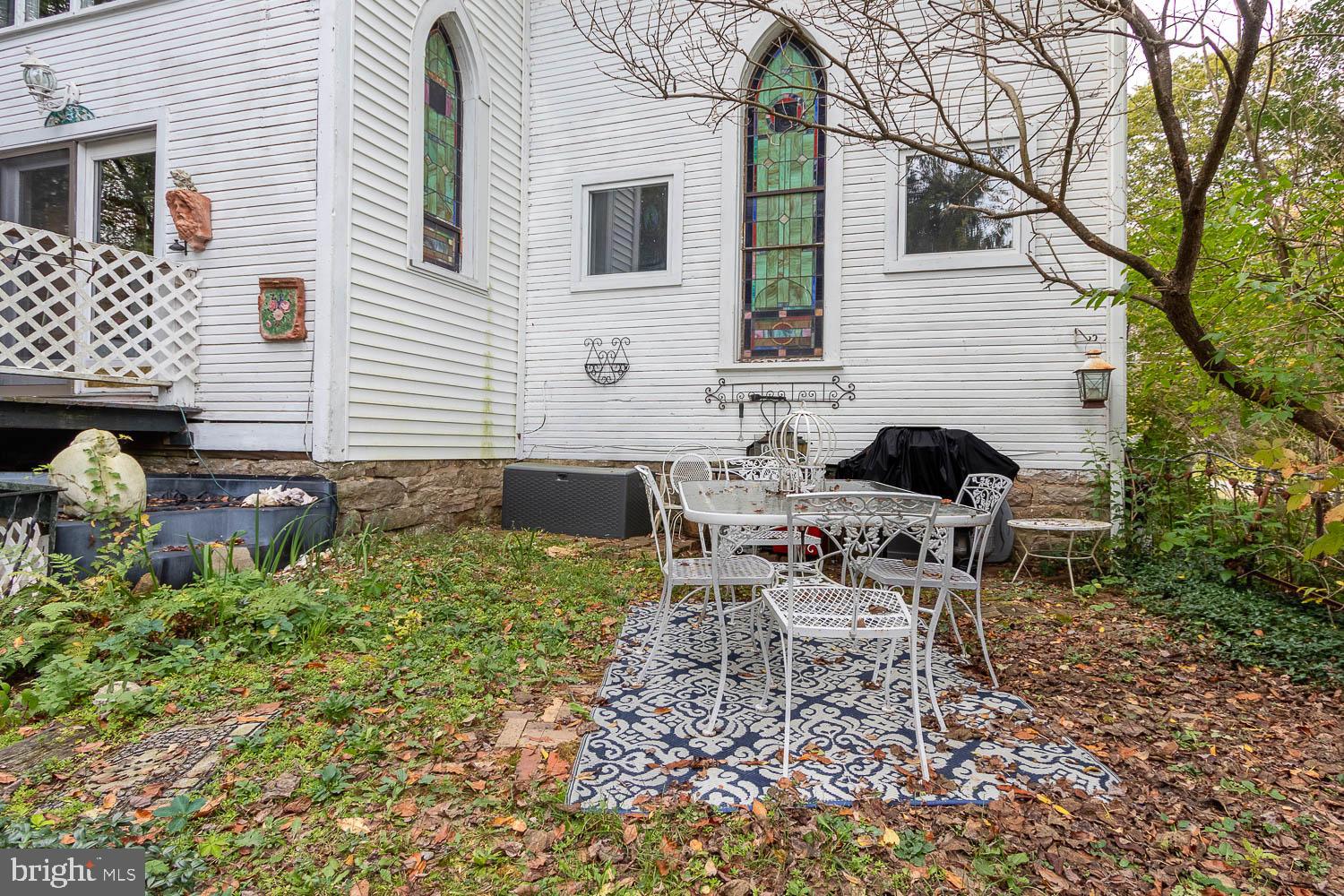 125 Colorado Road Munson, PA 16860 - Photo 8 of 43 a backyard of a house with outdoor seating
