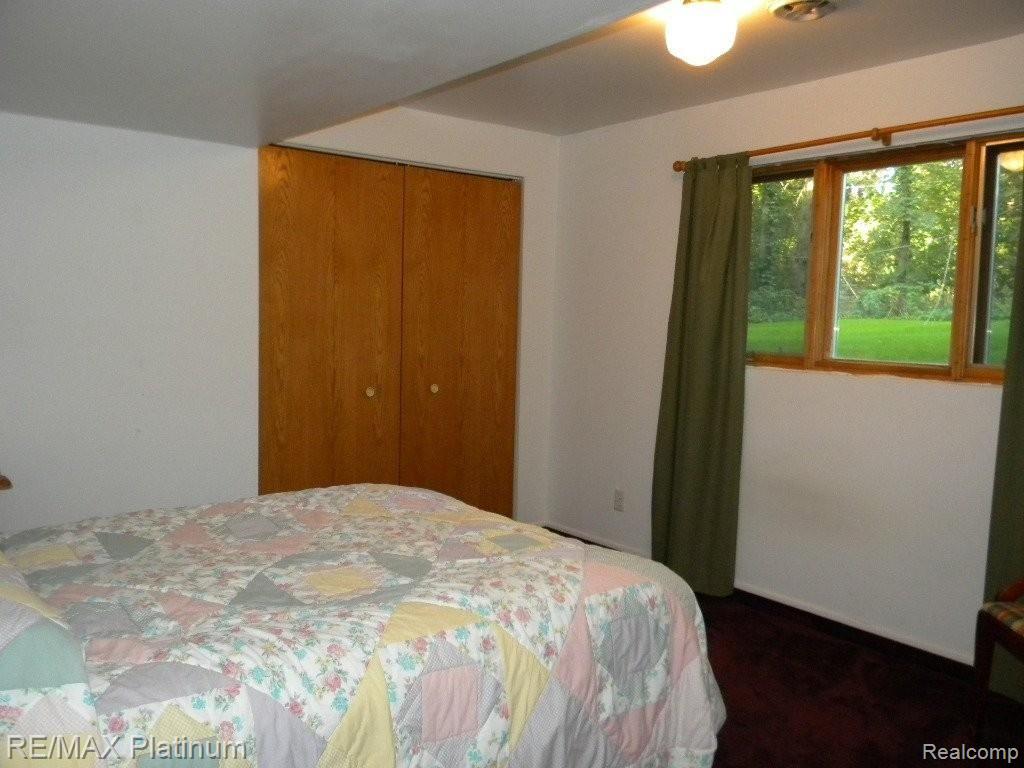 1240 Grebe Road Highland, MI 48357 - Photo 18 of 25 Lower Level Bedroom