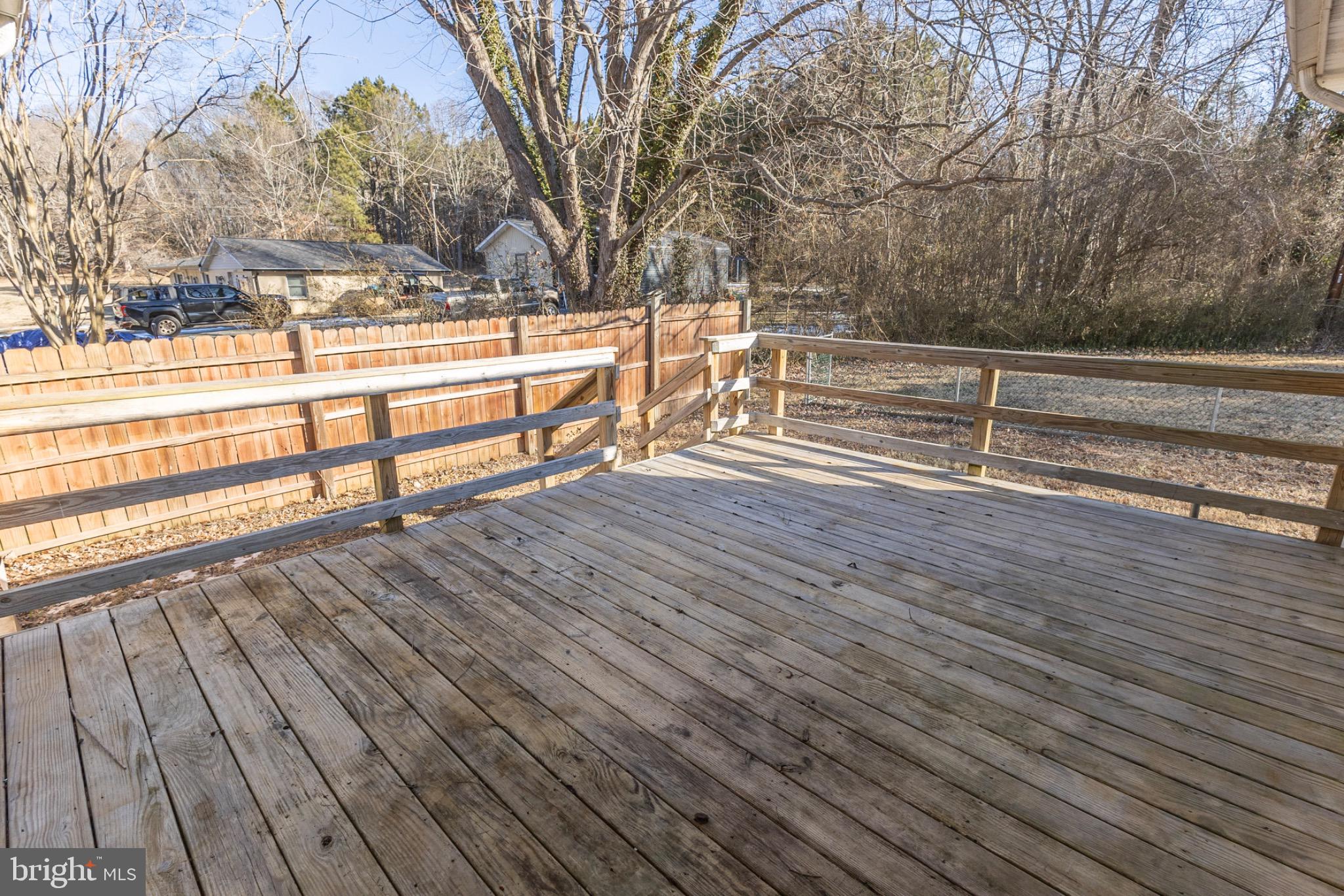 49151 Wynne Road Ridge, MD 20680 - Photo 73 of 80 Spacious deck overlooking serene backyard.