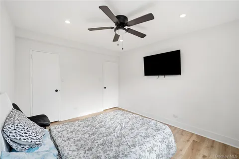 a living room with furniture and a chair