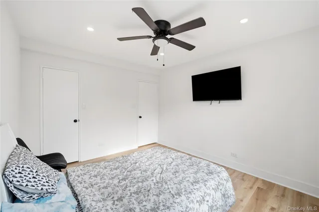 a living room with furniture and a chair