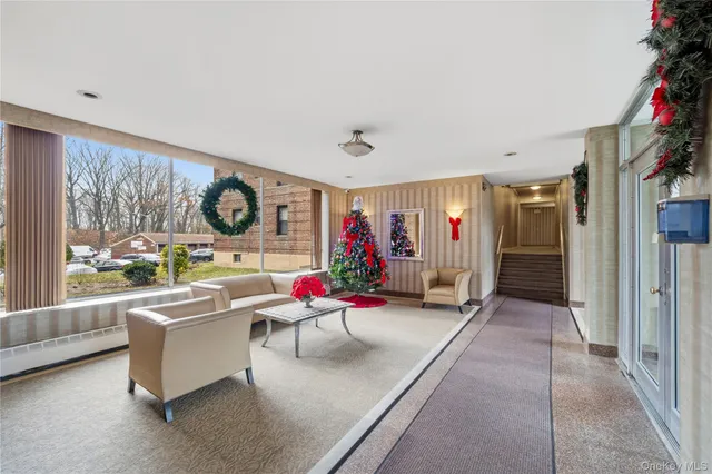 a living room with furniture and window