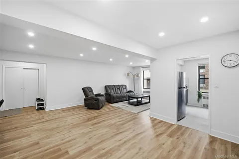 a kitchen with sink cabinets and stove top oven