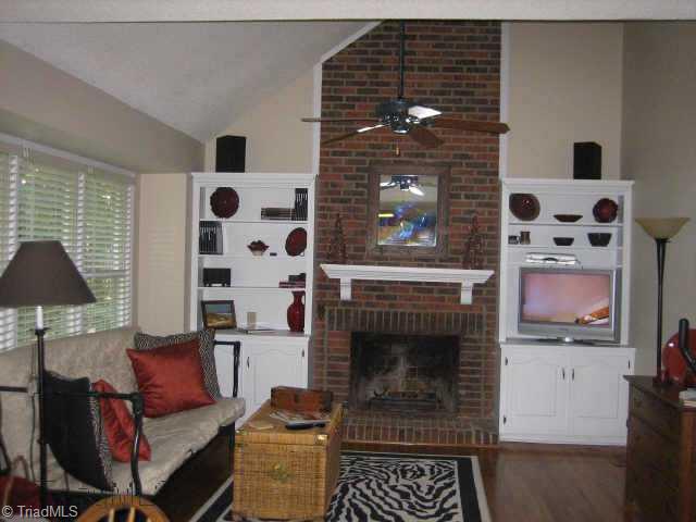5102 Candlewick Road Greensboro, NC 27455 - Photo 2 of 8 Other. Fireside Den with vaulted ceiling and tons of natural sunlight