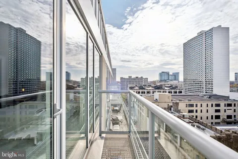 a view of a balcony with city view