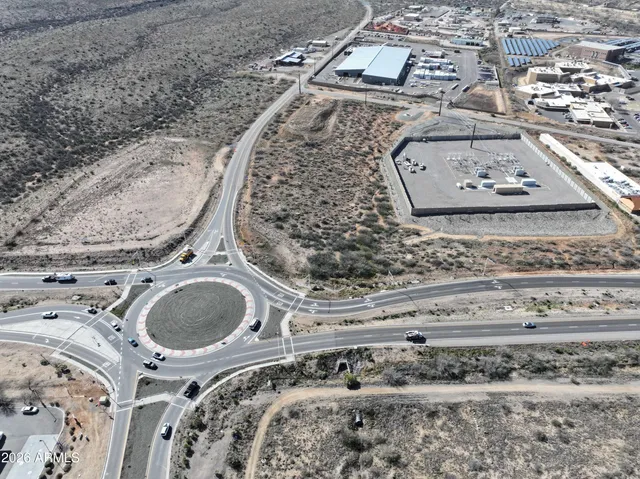a view of multiple houses with a road