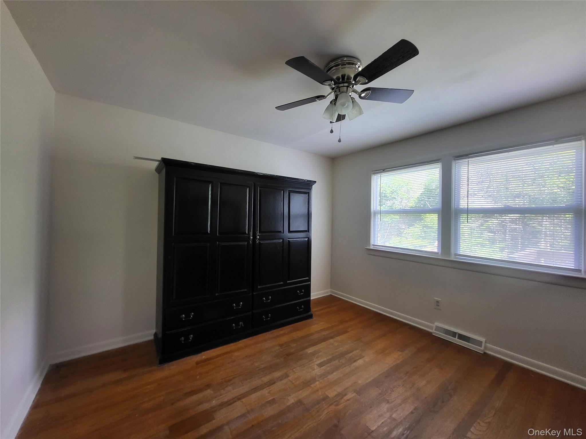 286 Dingle Daisy Road Monticello, NY 12701 - Photo 23 of 35 a view of room with a ceiling fan and a window