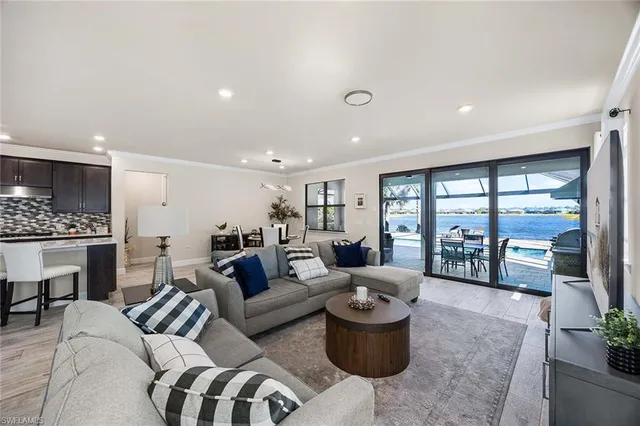 a living room with furniture or outdoor view and a large window