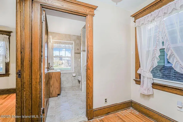 a bathroom with a tub a sink and a shower