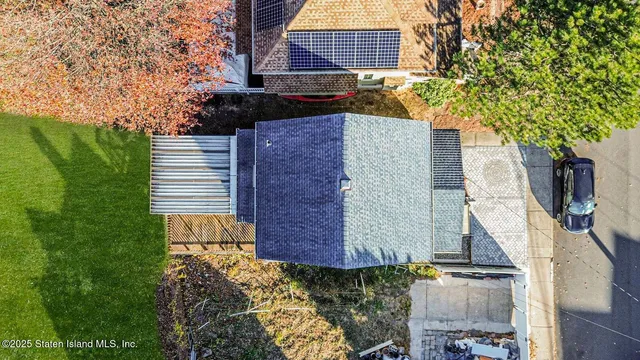 a picture of a room with a floor to ceiling window