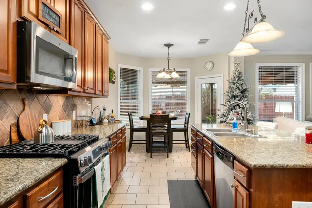 a kitchen with granite countertop lots of counter top space