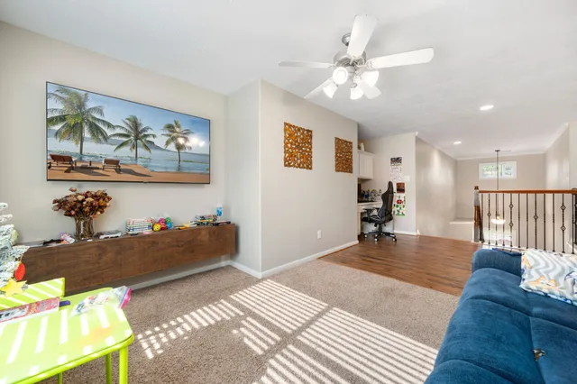 a bedroom with furniture and a chandelier
