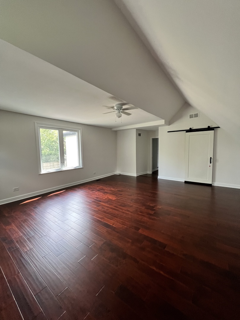 2535 Techny Road Northbrook, IL 60062 - Photo 19 of 30 a view of a livingroom with wooden floor and window