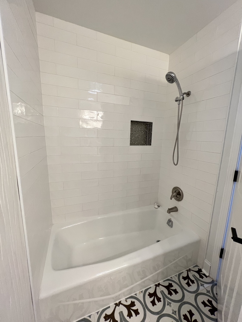 2535 Techny Road Northbrook, IL 60062 - Photo 22 of 30 a bathroom with a bathtub
