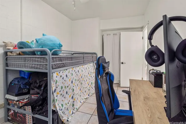 a bed room with furniture and a closet