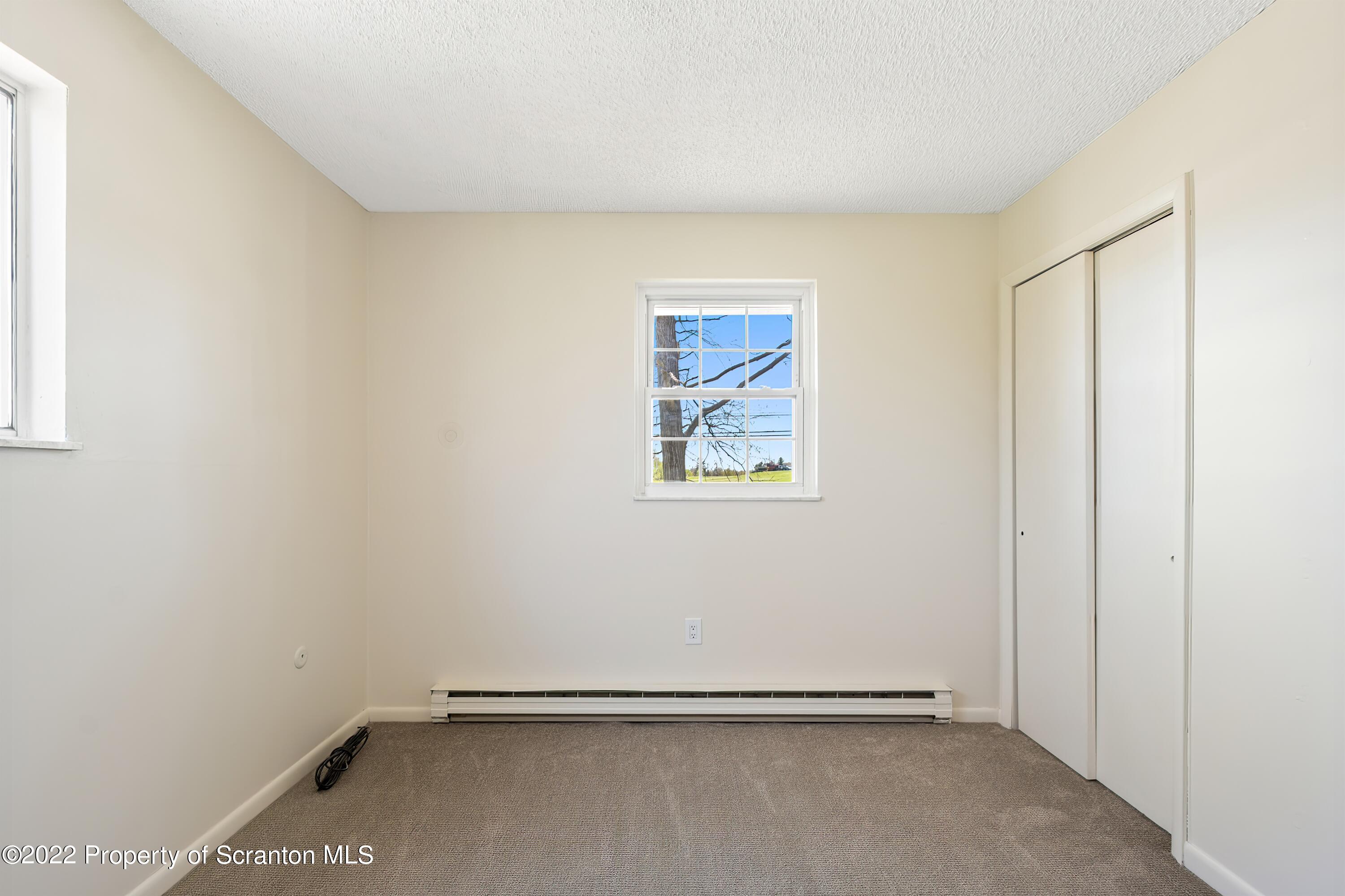 219 Noble Road Clarks Summit, PA 18411 - Photo 14 of 33 an empty room with a empty space