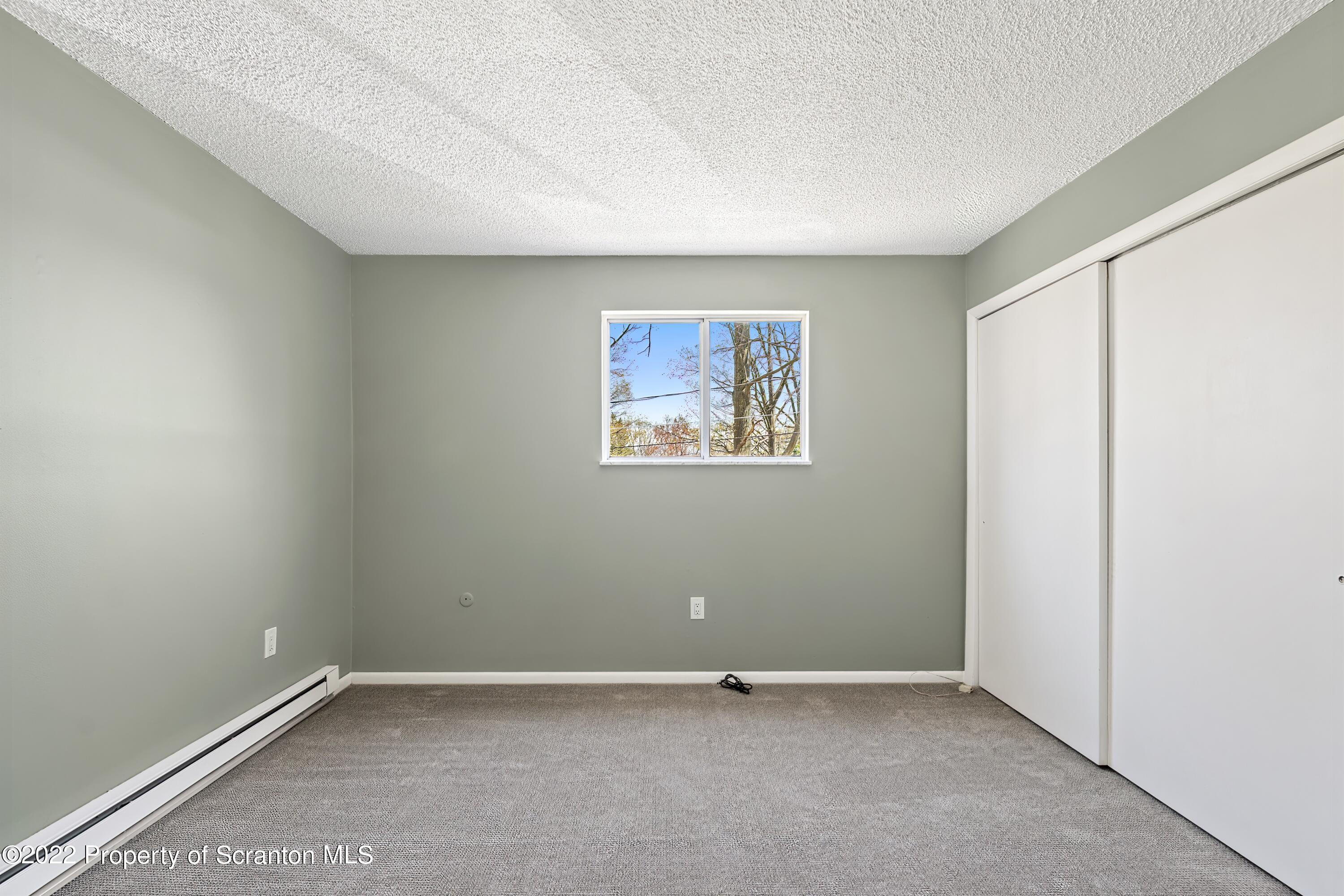 219 Noble Road Clarks Summit, PA 18411 - Photo 17 of 33 an empty room with a window