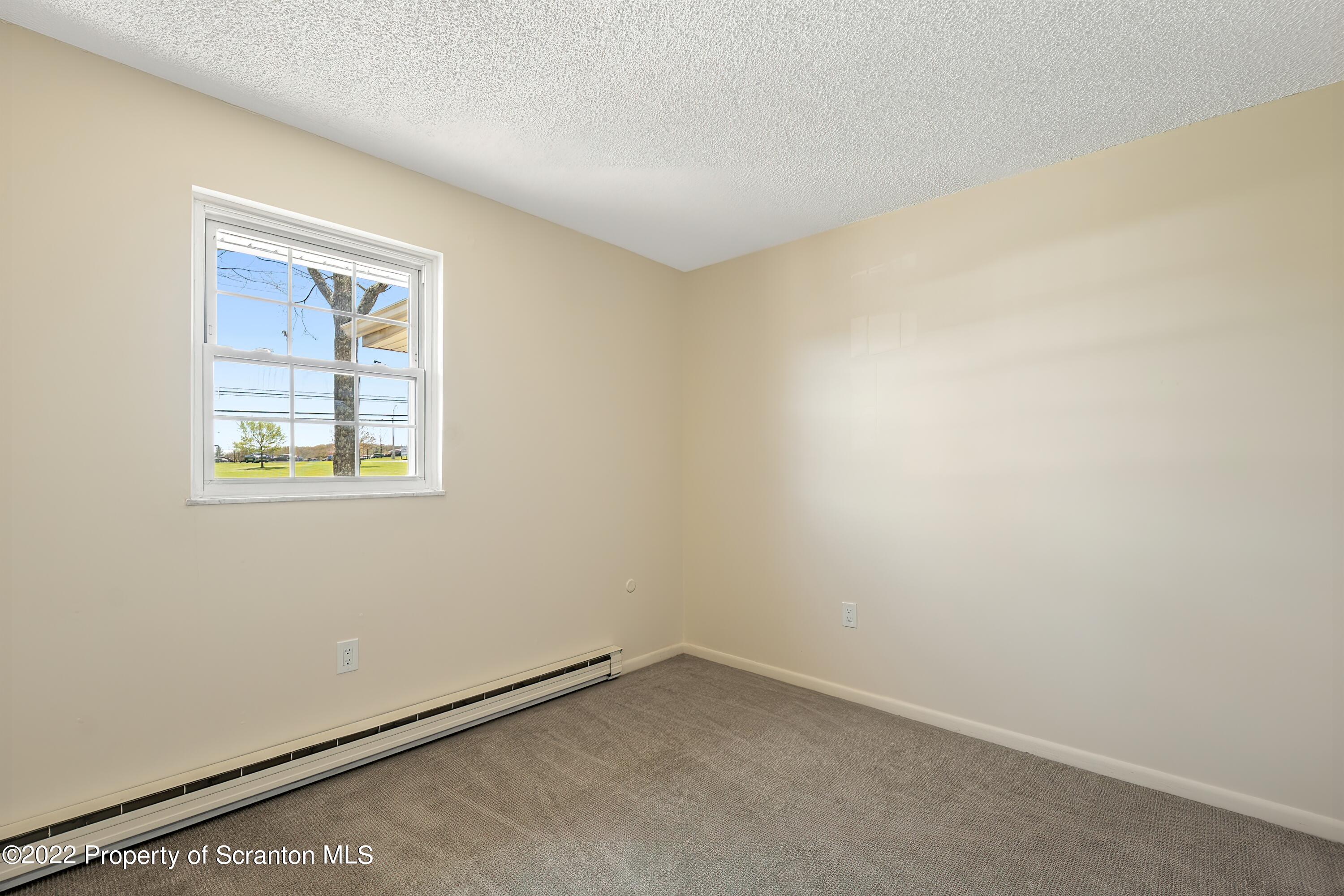 219 Noble Road Clarks Summit, PA 18411 - Photo 18 of 33 an empty room with a window