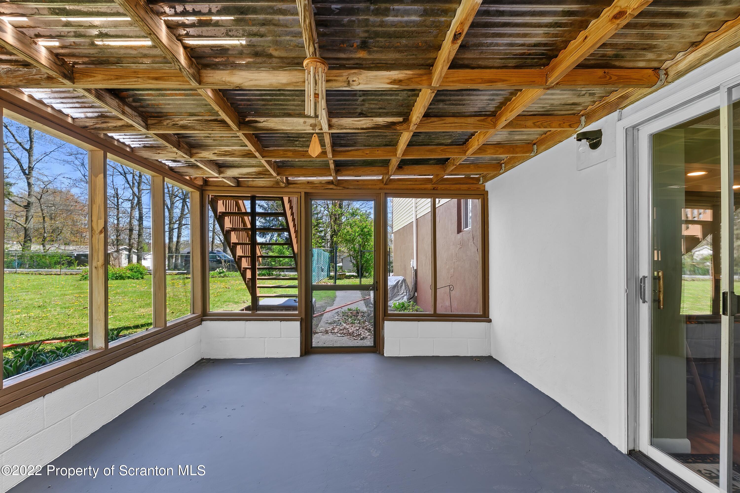 219 Noble Road Clarks Summit, PA 18411 - Photo 27 of 33 a view of a room with wooden walls