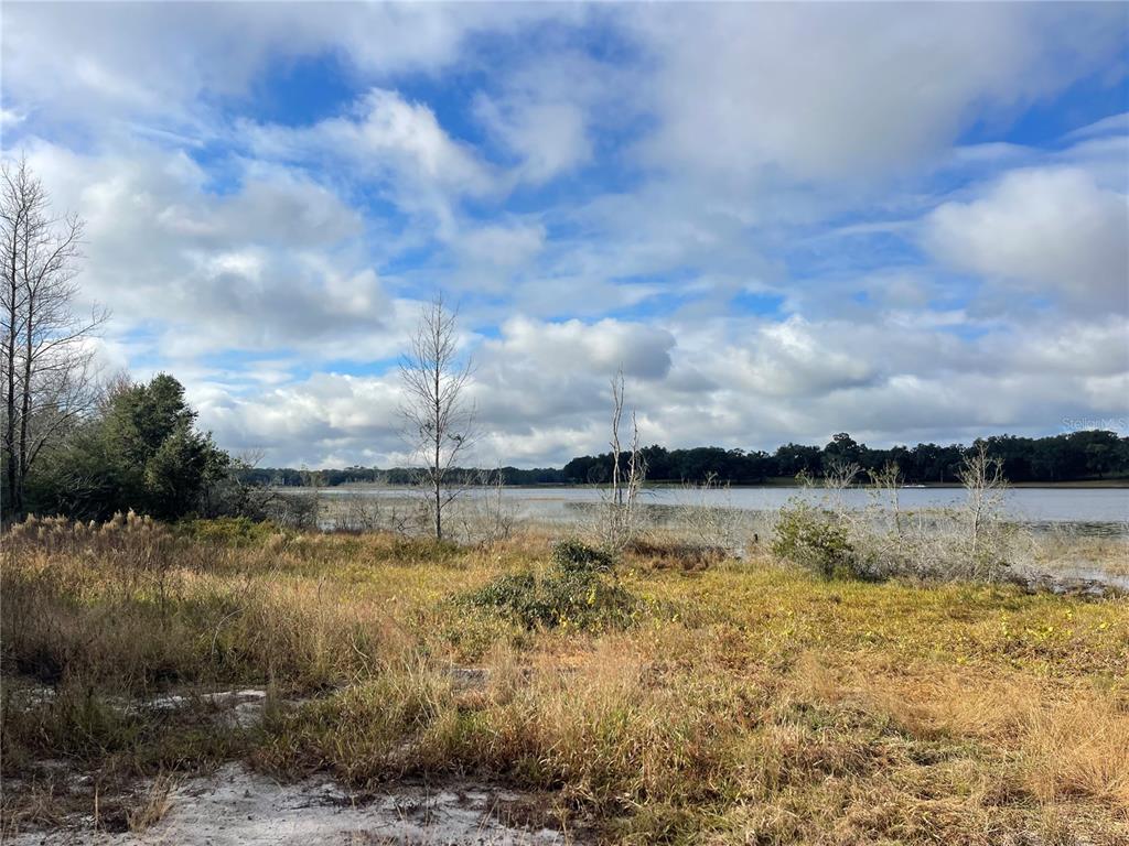 Grays Airport Road Lady Lake, FL 32159 - Photo 2 of 11 a view of a lake view