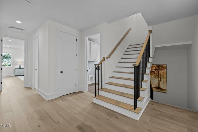 a view of entryway with wooden floor