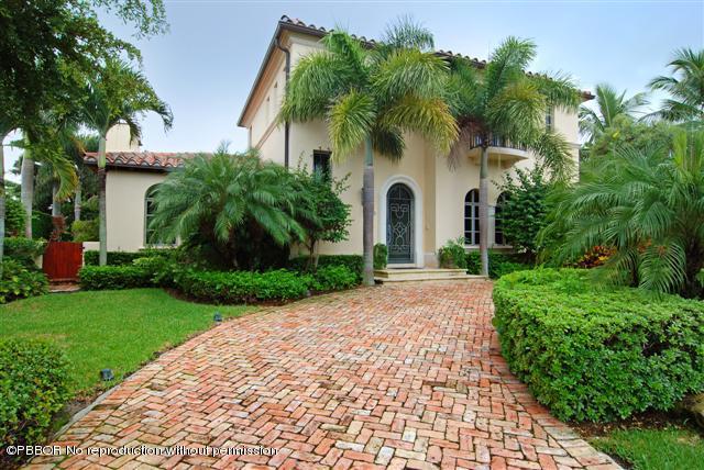 300 Arabian Road Palm Beach, FL 33480 - Photo 1 of 8 a front view of a house with garden