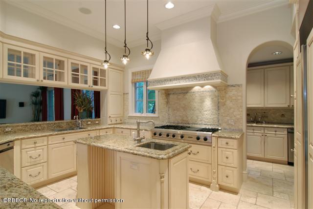 300 Arabian Road Palm Beach, FL 33480 - Photo 5 of 8 a kitchen with stainless steel appliances granite countertop a stove and a sink