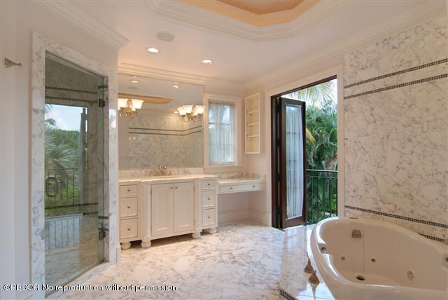 300 Arabian Road Palm Beach, FL 33480 - Photo 7 of 8 a bathroom with a bathtub and a sink