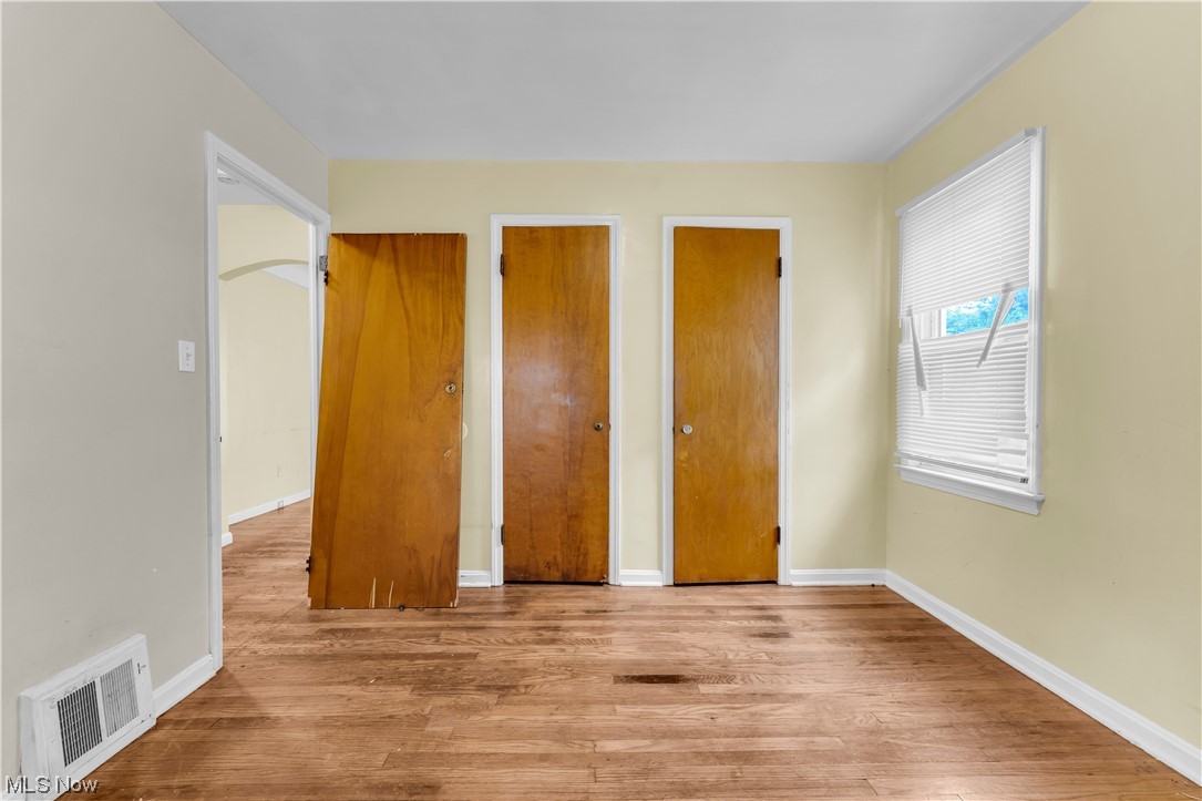 5619 Dunham Road Maple Heights, OH 44137 - Photo 8 of 19 Unfurnished bedroom with light hardwood flooring