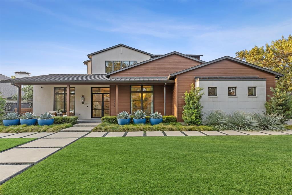 4447 Taos Road Dallas, TX 75209 - Photo 2 of 40 a front view of a house with a yard table and chairs