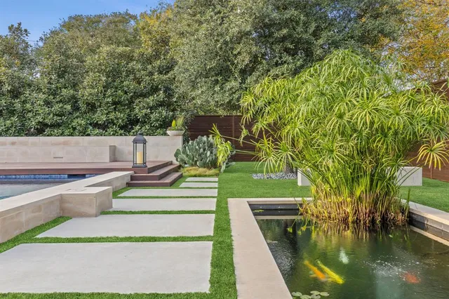 a view of swimming pool with lounge chair