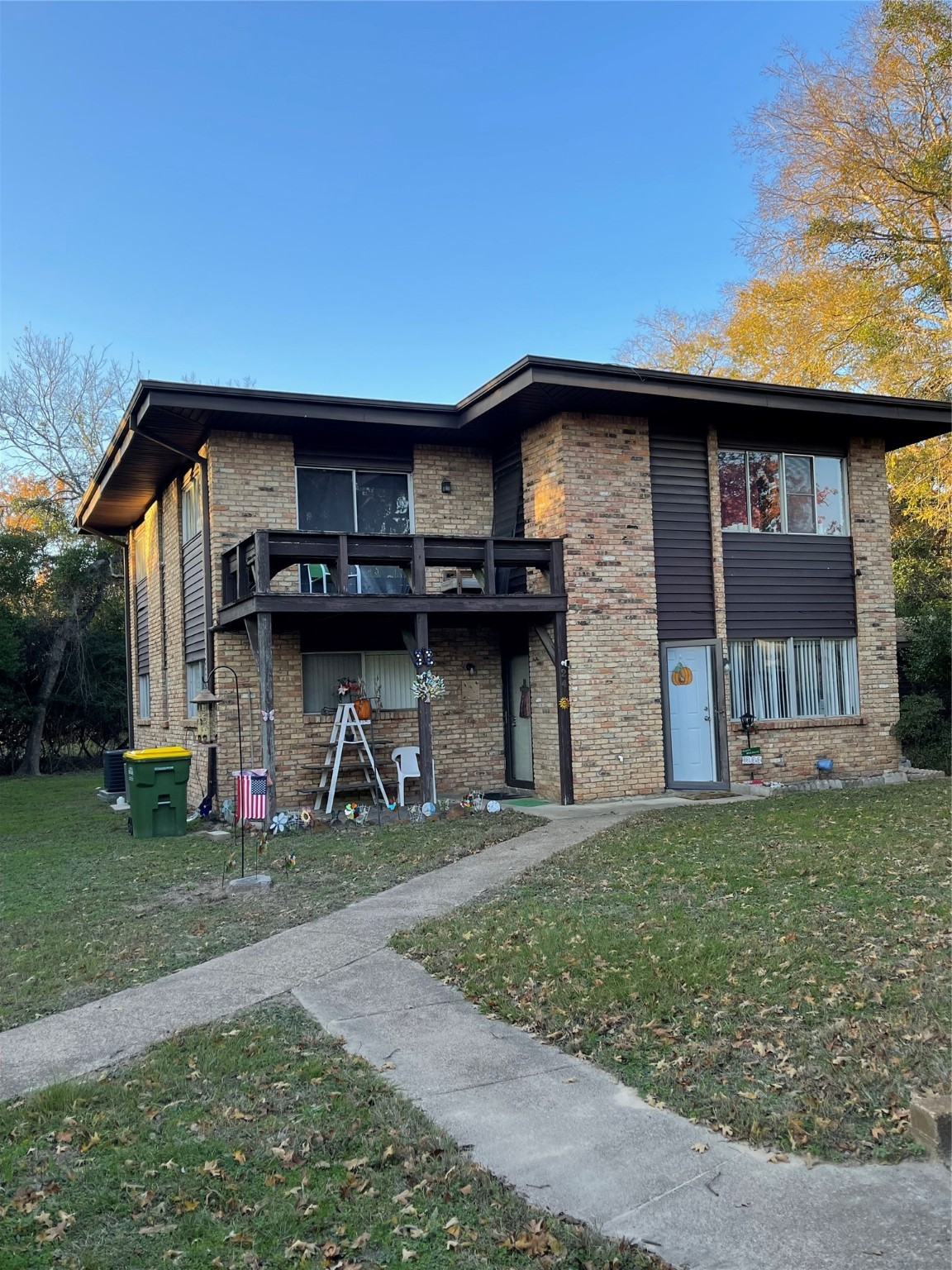 24 Daytona Lane Normangee, TX 77871 - Photo 5 of 26 Front view of units. Upstairs unit access is from the left side patio. Downstairs unit access is the white door to the right.