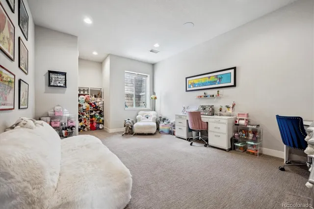 a view of a chairs and table in patio