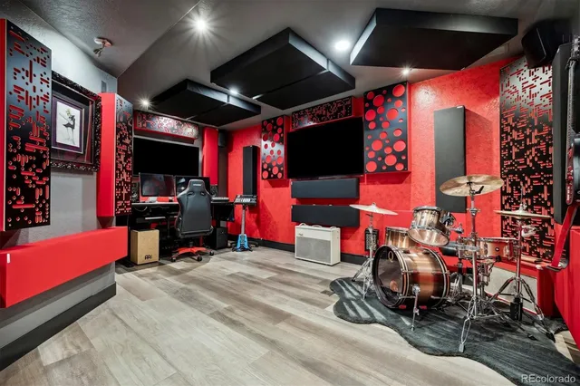 a front view of a house with a yard and trees