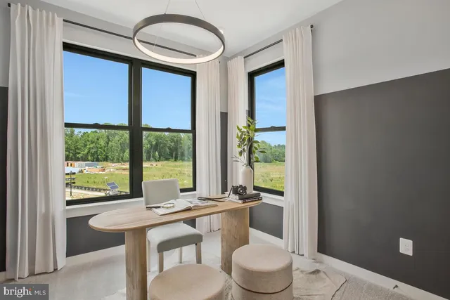 a bathroom with a toilet a sink and a window