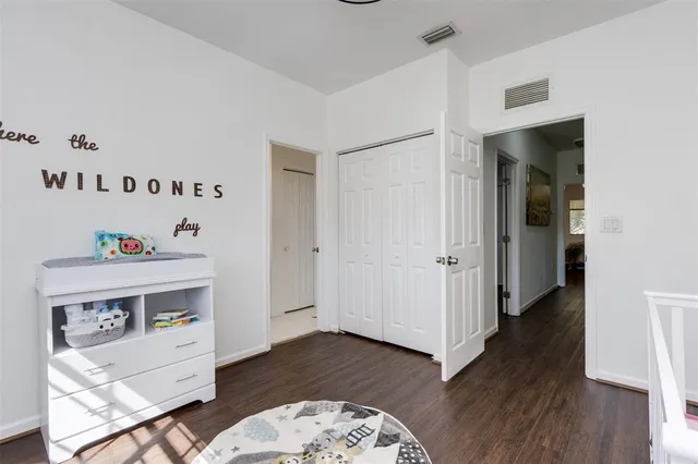 a room with furniture and wooden floor