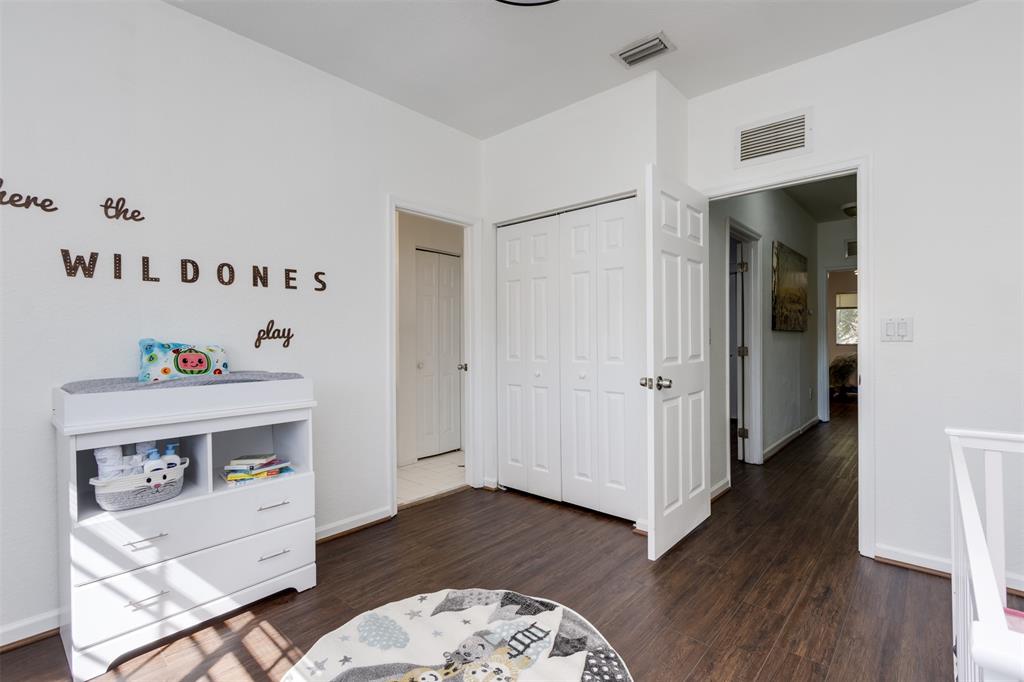 5545 Monte Carlo Place, Unit 5545 Margate, FL 33068 - Photo 23 of 41 a room with furniture and wooden floor