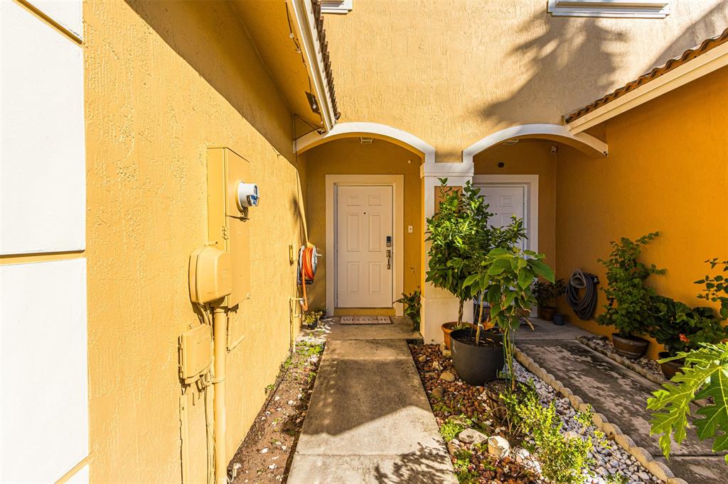 5545 Monte Carlo Place, Unit 5545 Margate, FL 33068 - Photo 29 of 41 a view of a entryway door of the house