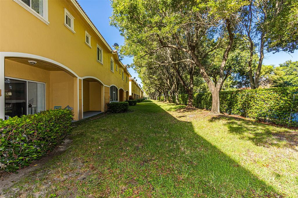 5545 Monte Carlo Place, Unit 5545 Margate, FL 33068 - Photo 34 of 41 a view of house with backyard