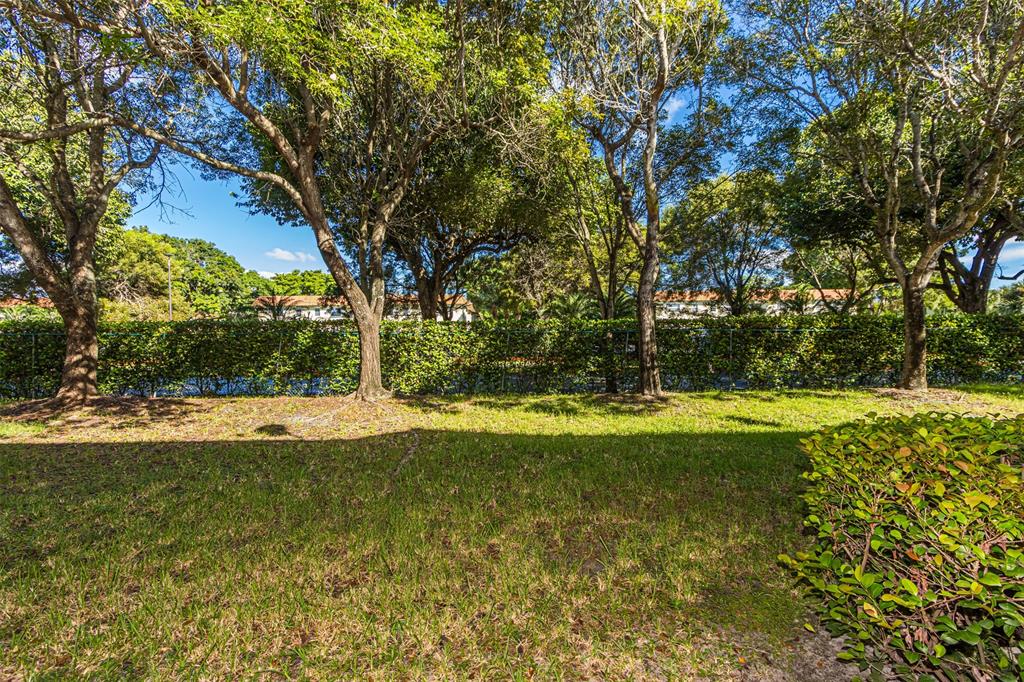 5545 Monte Carlo Place, Unit 5545 Margate, FL 33068 - Photo 36 of 41 a view of swimming pool with a yard